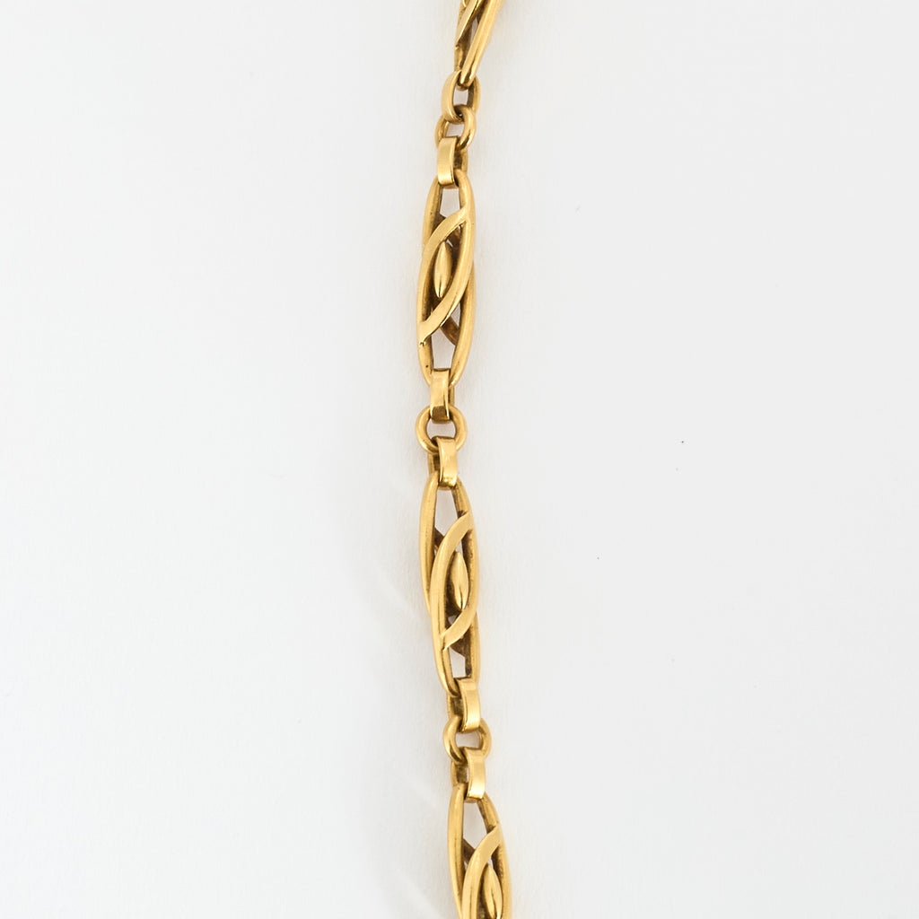 Collier filigrane collerette en or et rubis