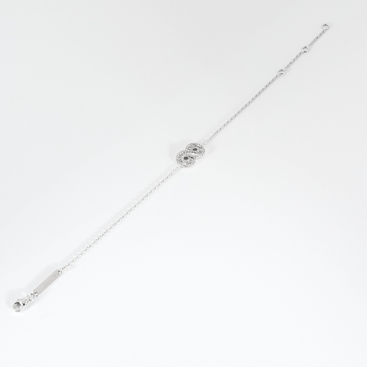 Bracelet infini en or blanc et diamants