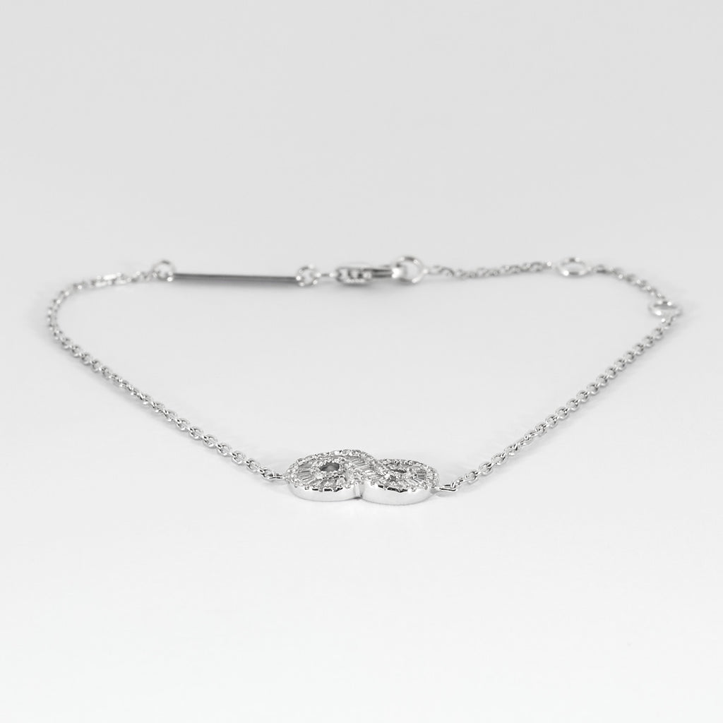 Bracelet infini en or blanc et diamants
