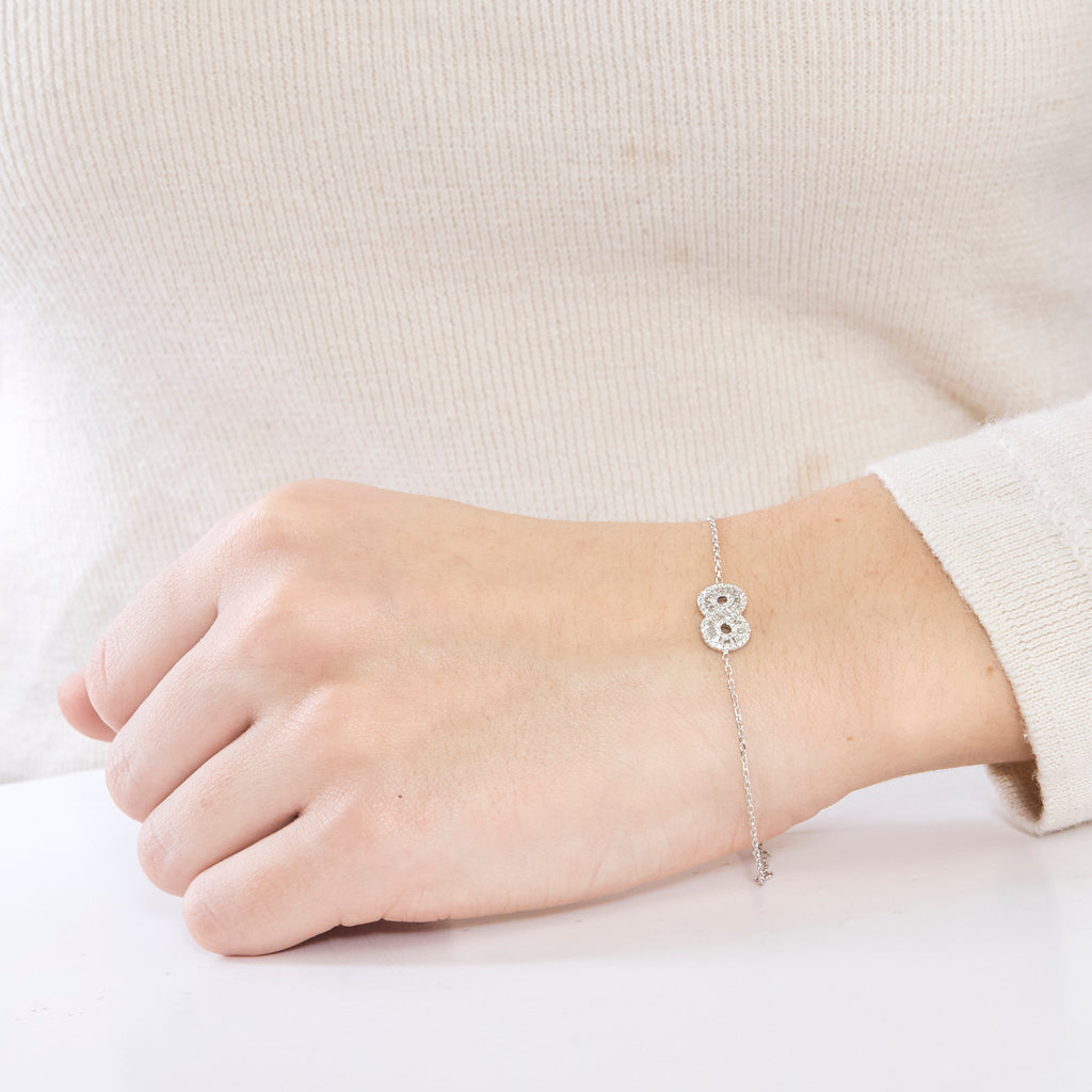 Bracelet infini en or blanc et diamants