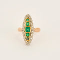 Bague Marquise en or, diamants et émeraudes.