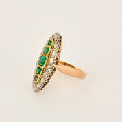 Bague Marquise en or, diamants et émeraudes.