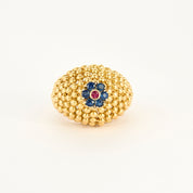Bague boules vintage en or jaune.