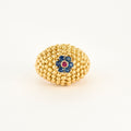 Bague boules vintage en or jaune.