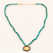 Collier pièce 2 Pesos en diamants, or et argent.