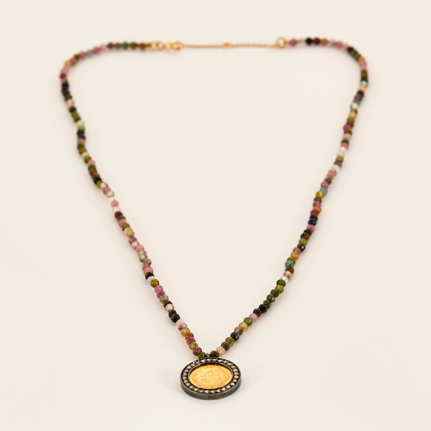 Collier pièce 2 Pesos, diamants or et argent.