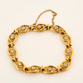 Bracelet ancien en or jaune et diamants tailles roses.