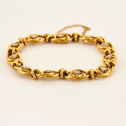 Bracelet ancien en or jaune et diamants tailles roses.