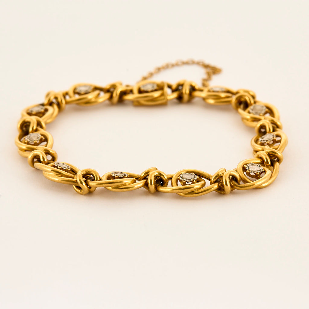 Bracelet ancien en or jaune et diamants tailles roses.