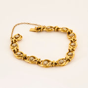 Bracelet ancien en or jaune et diamants tailles roses.