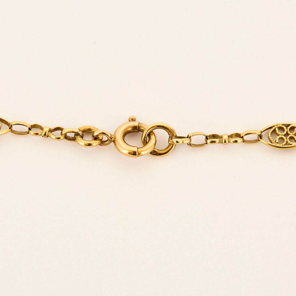 Chaine vintage filigrane fine en or jaune.