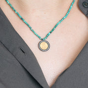 Collier pièce 2 Pesos en diamants, or et argent.