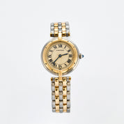 Montre Cartier Panthère ronde or et acier.