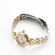 Montre Cartier Panthère ronde or et acier.