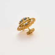 Boucles d'oreilles en or jaune et Aigue-marine.