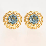 Boucles d'oreilles en or jaune et Aigue-marine.