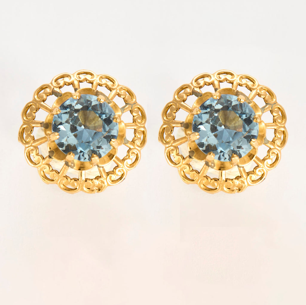 Boucles d'oreilles en or jaune et Aigue-marine.