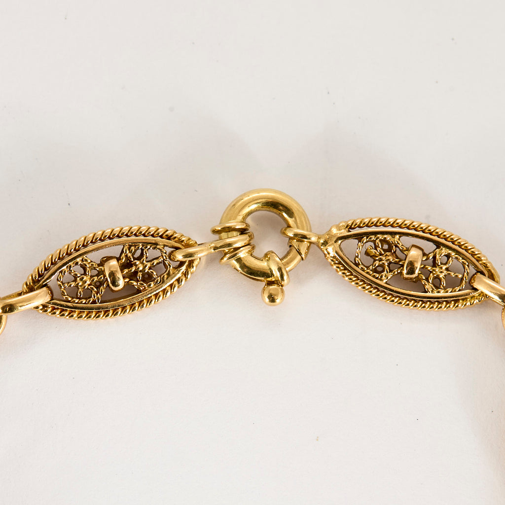 Bracelet mailles filigranes torsadé en or