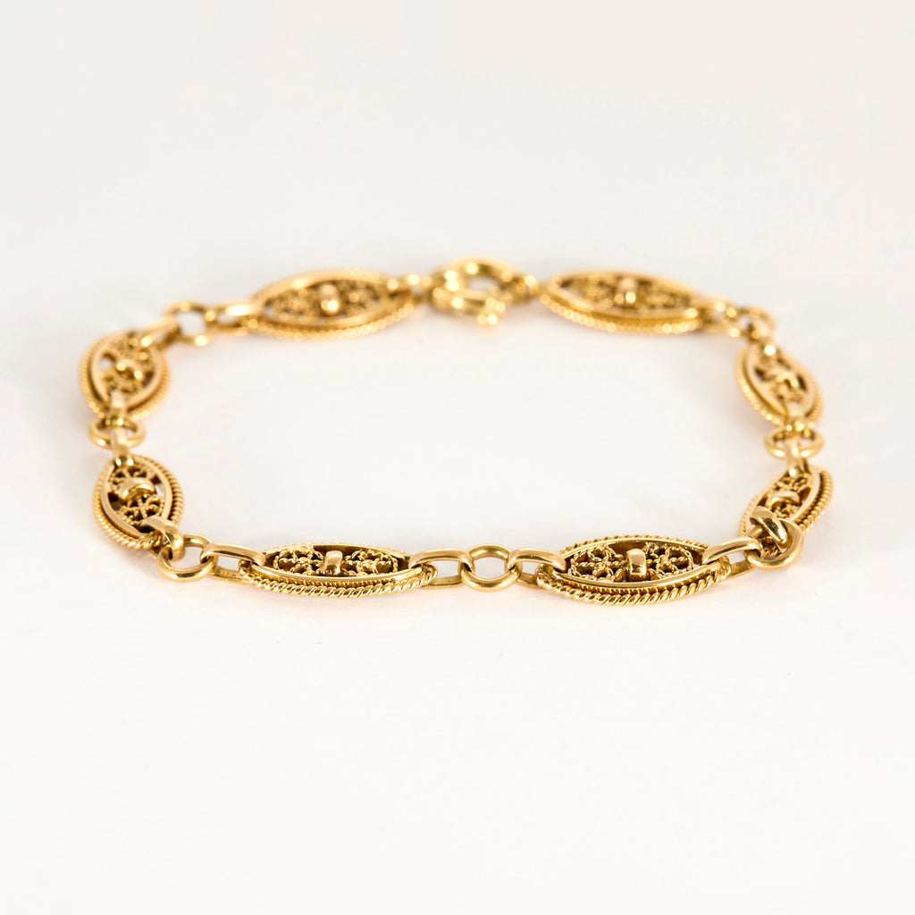 Bracelet mailles filigranes torsadé en or