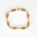 Bracelet mailles filigranes torsadé en or