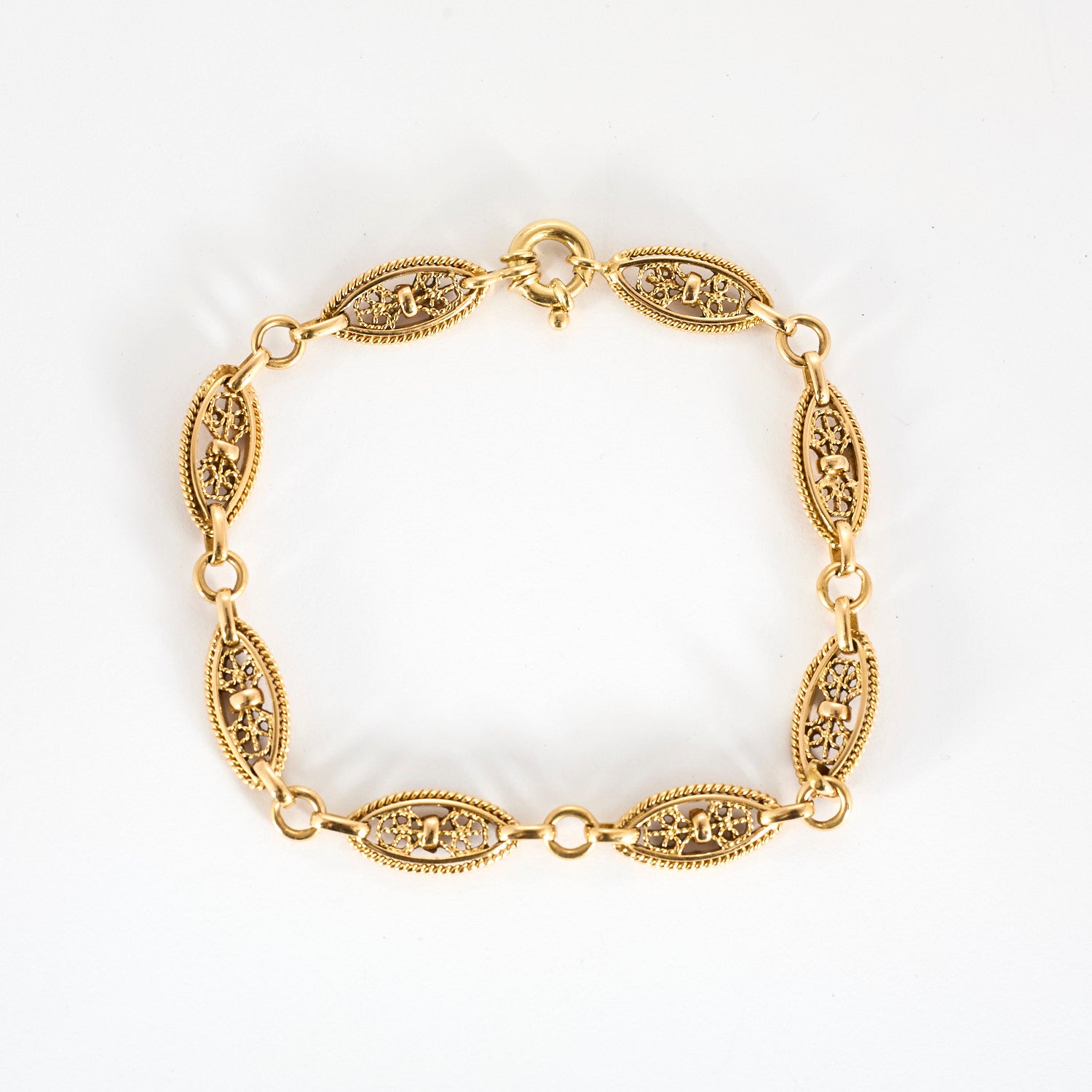 Bracelet mailles filigranes torsadé en or