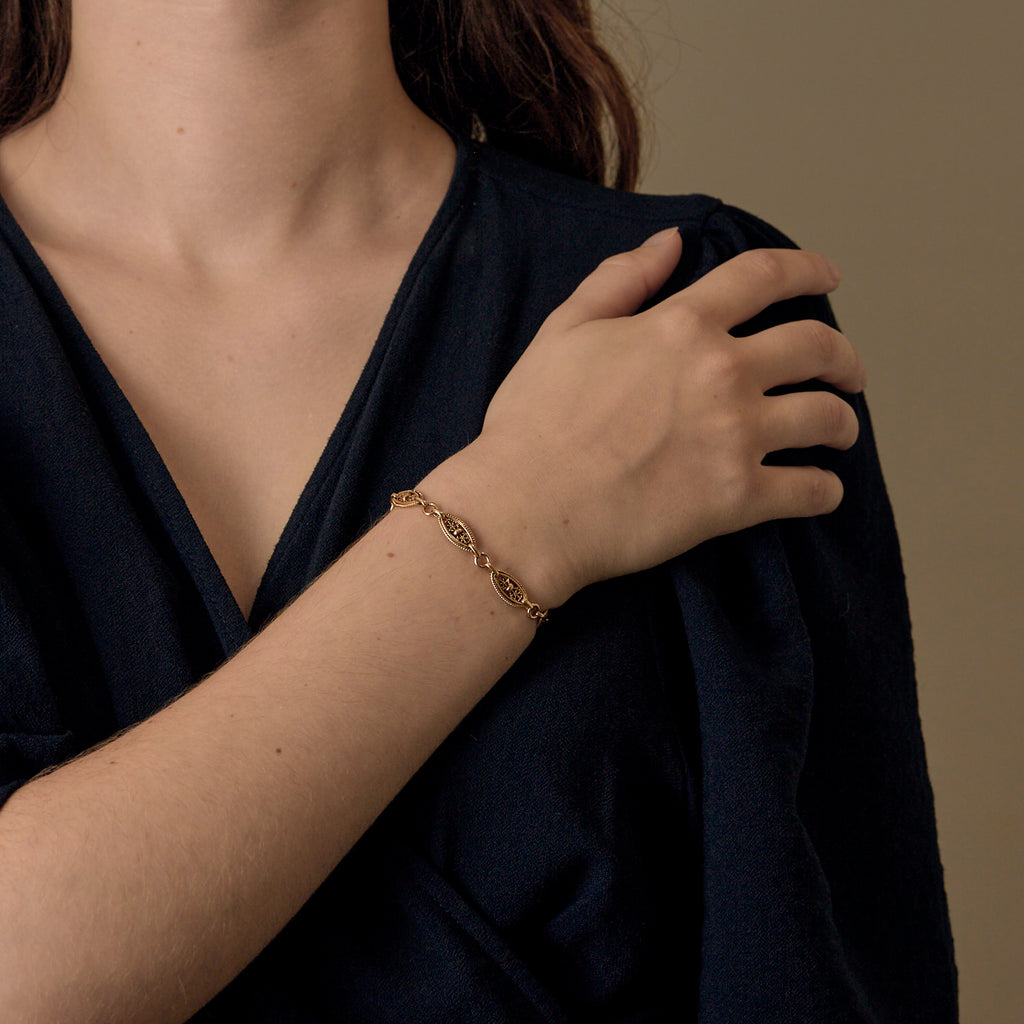 Bracelet mailles filigranes torsadé en or