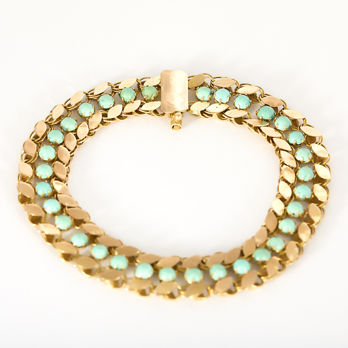 Bracelet ancien en or rose et turquoise.