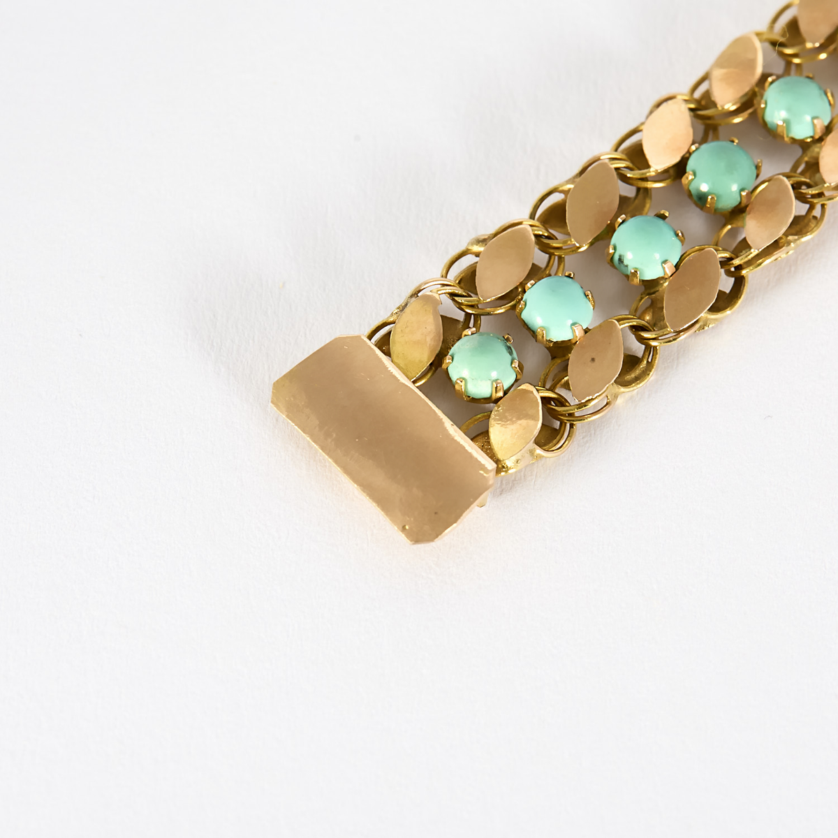 Bracelet ancien en or rose et turquoise.