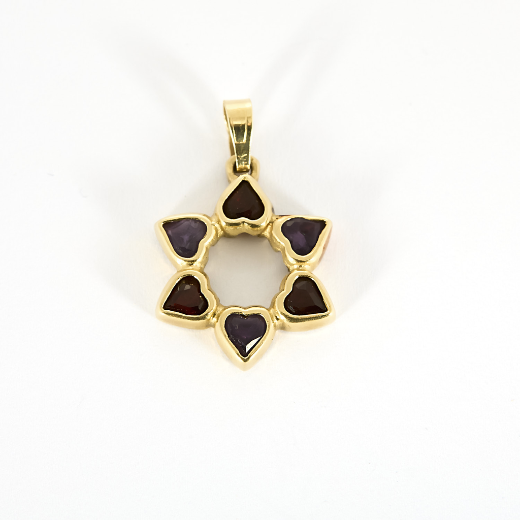 Pendentif Magen David vintage or et pierres.