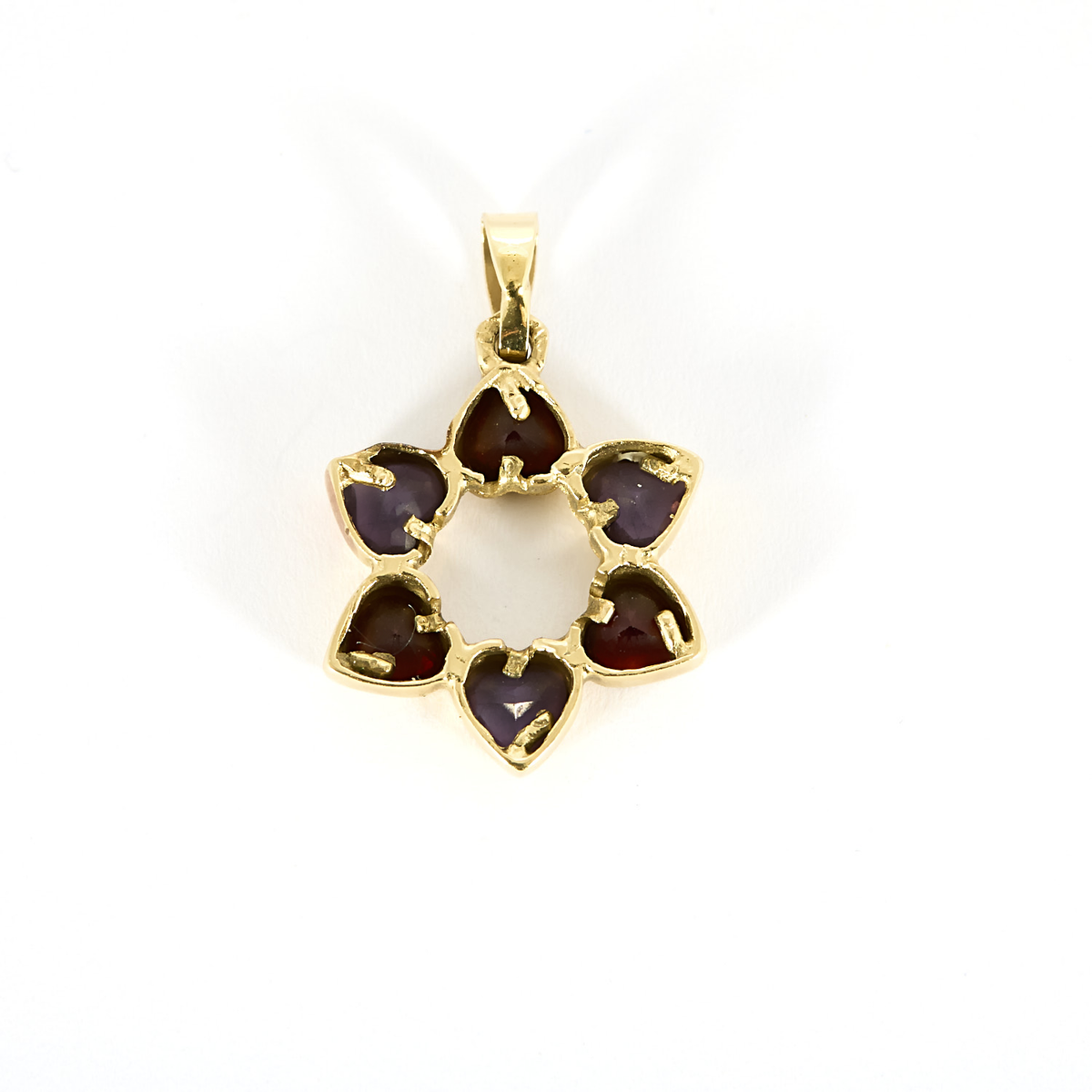 Pendentif Magen David vintage or et pierres.