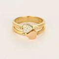 Bague double anneau motifs cœurs en or et diamants