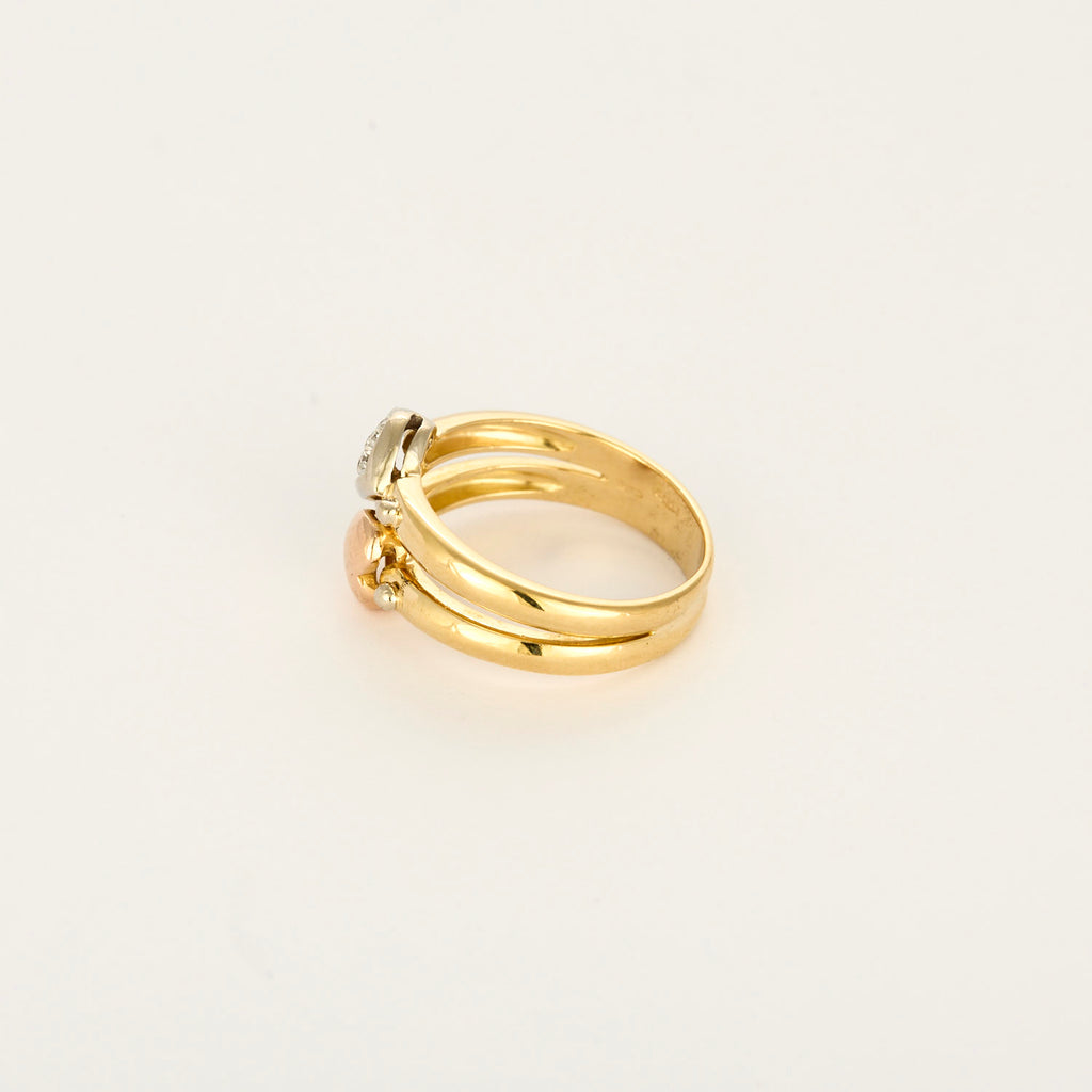 Bague double anneau motifs cœurs en or et diamants