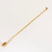 Bracelet torsadé en or jaune saphir et diamants.