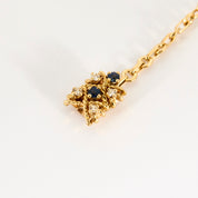 Bracelet torsadé en or jaune saphir et diamants.