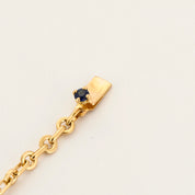 Bracelet torsadé en or jaune saphir et diamants.