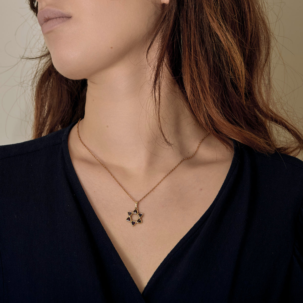 Pendentif Magen David vintage or et pierres.