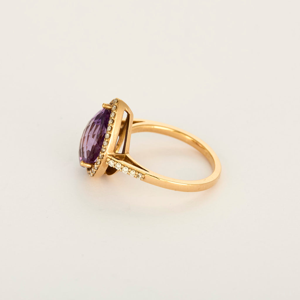 Bague en or rose, diamants et Améthyste poire.