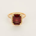 Bague en or rose en Diamants et Grenat Rhodolite