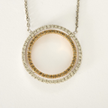 Collier double cercle en or et diamants blanc & cognac.