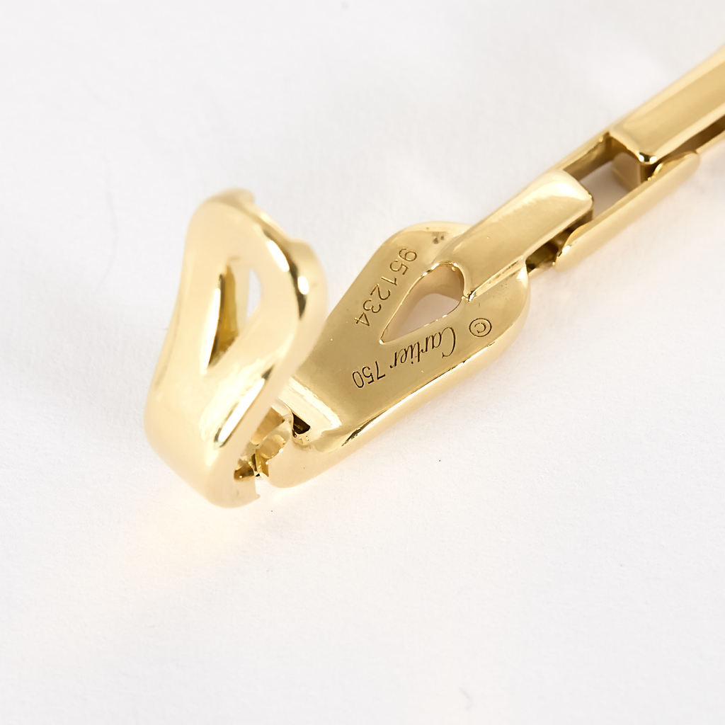Bracelet CARTIER collection "Agrafe" en or jaune.