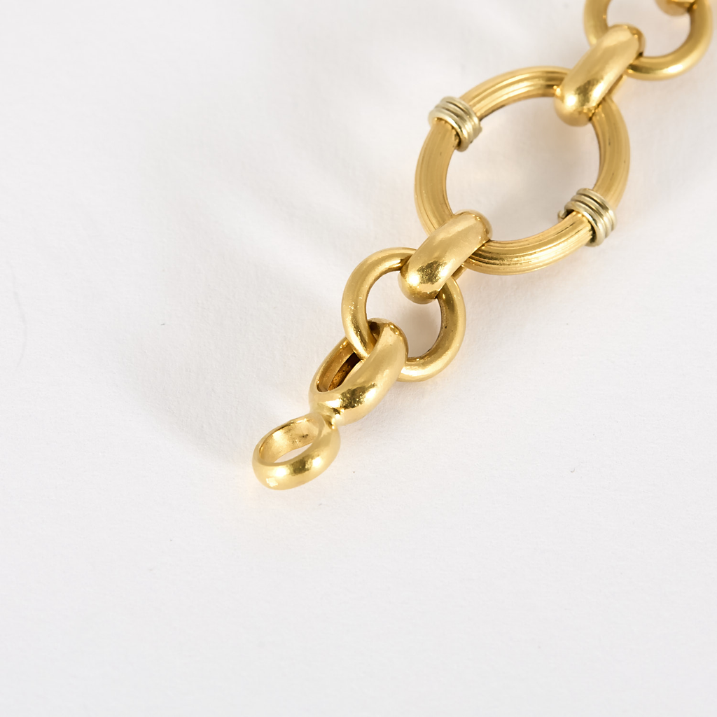 Bracelet ancien mailles ovale en or jaune.