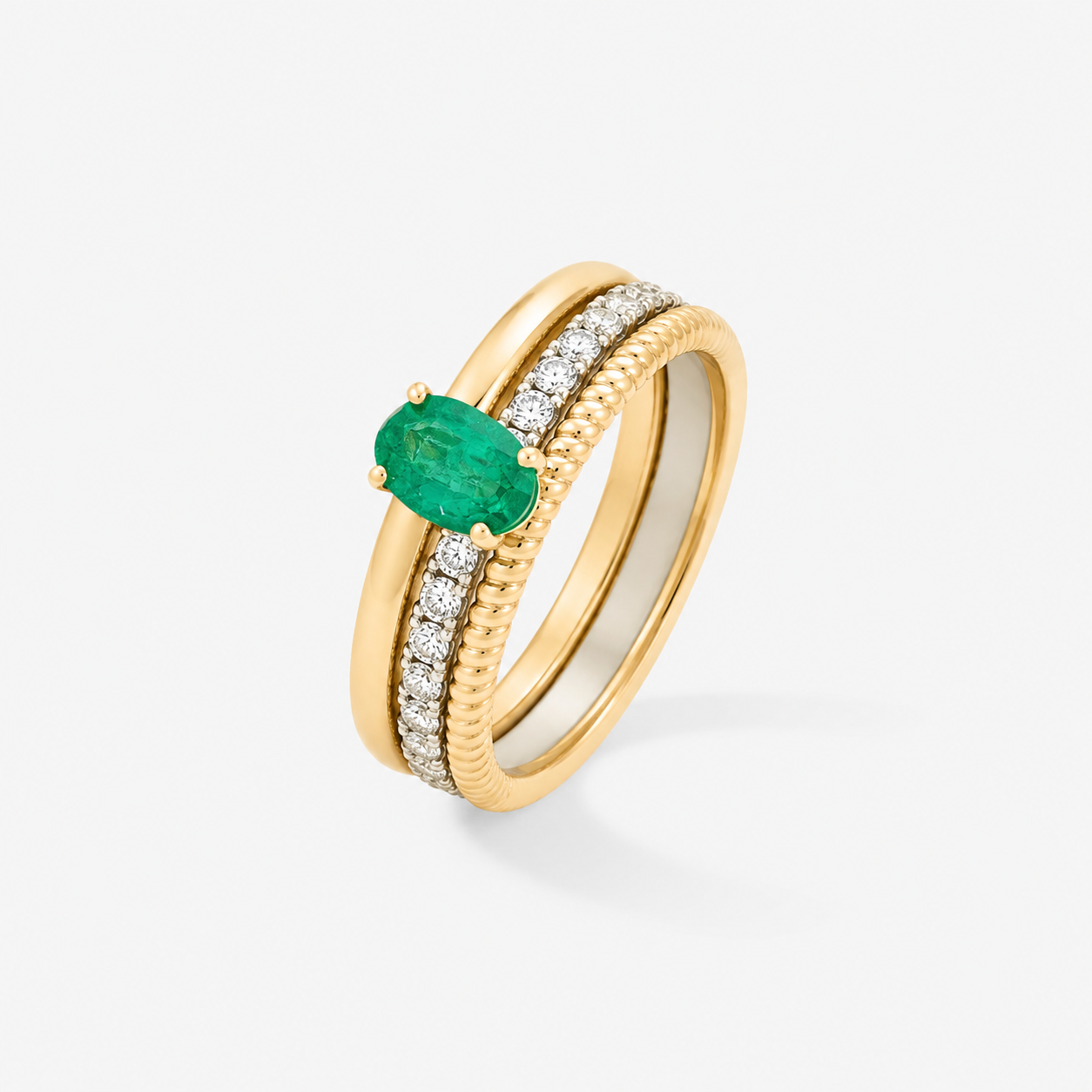 Bague multi-anneaux 3 rangs émeraude.
