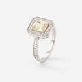 Bague style "Art Deco" en or blanc, saphir jaune et diamants.