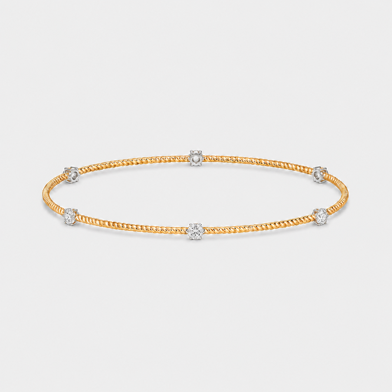 Bracelet jonc torsadé en or jaune et diamants – 1,17 carat