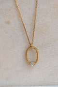 Collier pendentif ovale torsadé en or jaune et diamant – 0,10 carat