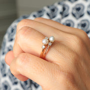 Double bague ancienne en or rose perles et diamants.