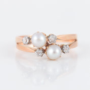 Double bague ancienne en or rose perles et diamants.
