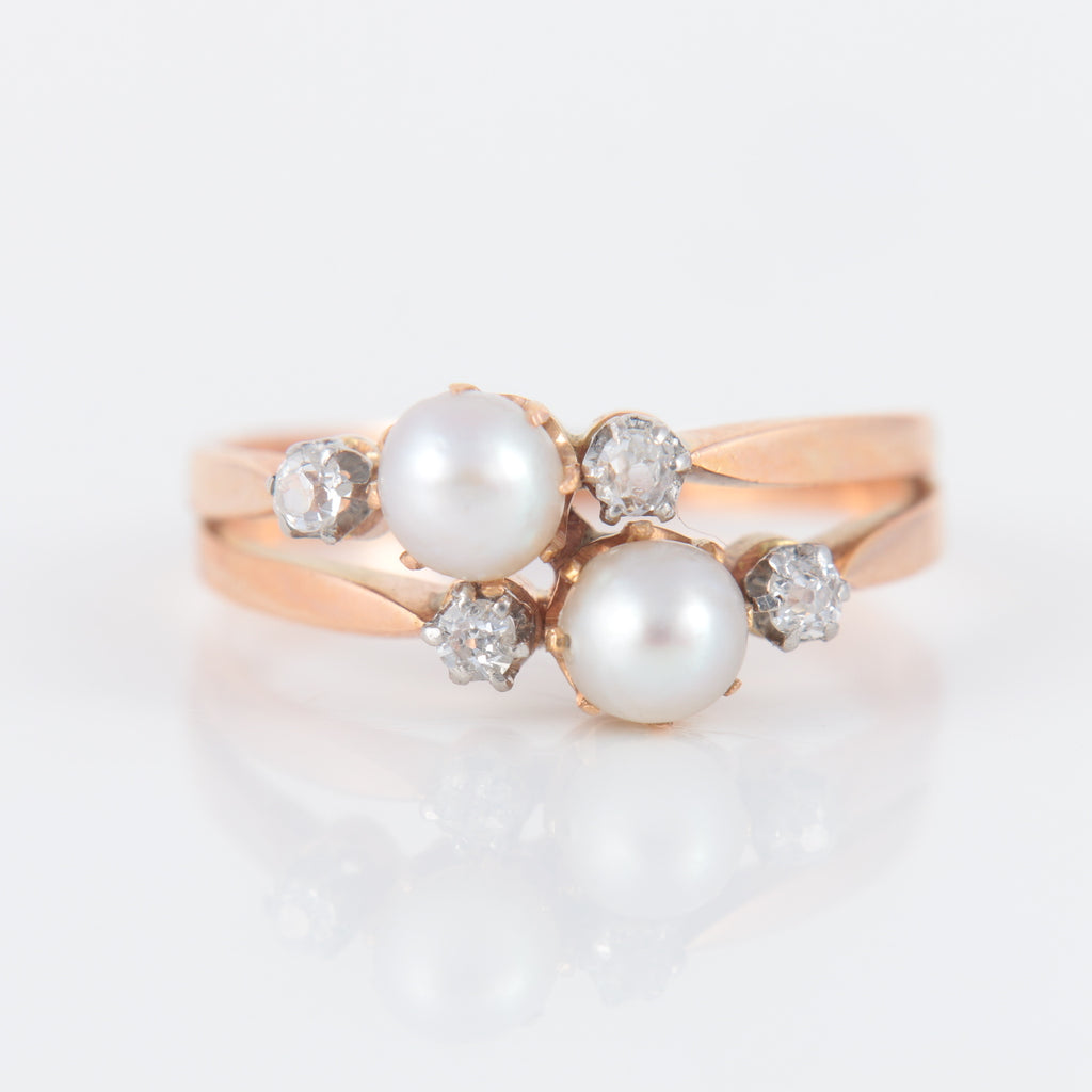 Double bague ancienne en or rose perles et diamants.