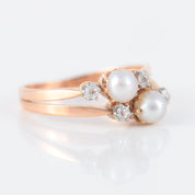 Double bague ancienne en or rose perles et diamants.