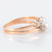 Double bague ancienne en or rose perles et diamants.